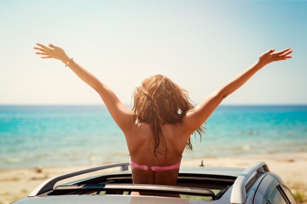 Woman enjoying a car ride in Crete with MotoStyle rental